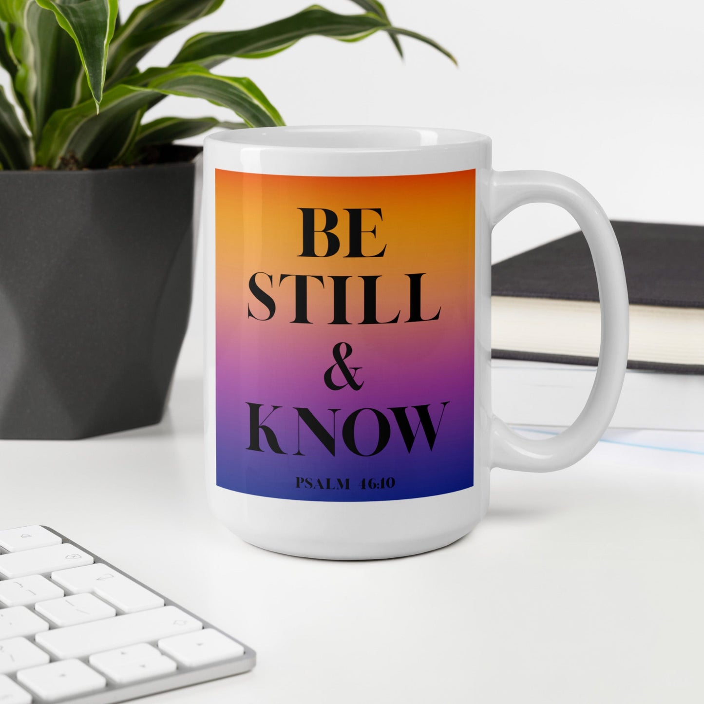 Side 2: “Be Still & Know” text design on mug.