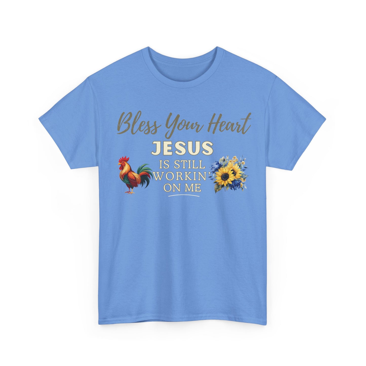Front Light blue Southern Christian t-shirt reading “Bless Your Heart — Jesus Is Still Workin’ On Me” with rooster and sunflower floral design