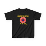 Front: Kids Christian t-shirt with superhero shield emblem that reads “Christ Is the Captain of My Life,” centered on chest