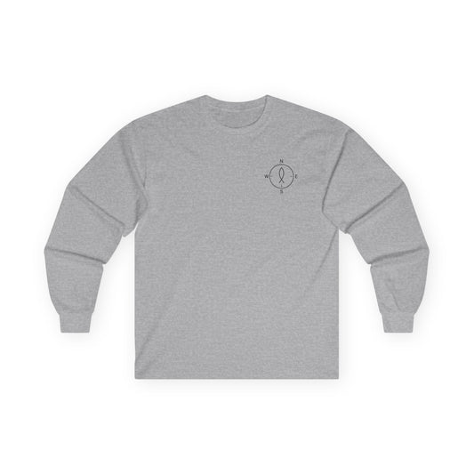 Front: Christian long sleeve shirt with minimalist compass emblem on left chest — subtle north/south/east/west design.
