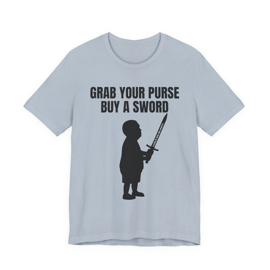 Front of light blue Christian t-shirt with black silhouette of a child holding a sword and bold text above reading ‘GRAB YOUR PURSE BUY A SWORD